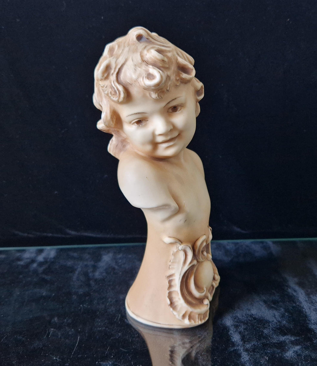 2 Antique Continental Patinated Bisque Porcelain Putti Child Bust Figures 7 inch