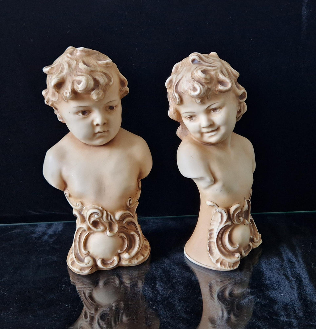 2 Antique Continental Patinated Bisque Porcelain Putti Child Bust Figures 7 inch